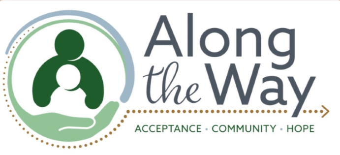 Green text with a circle that contains a child and caregiver