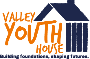 valley youth house in orange text