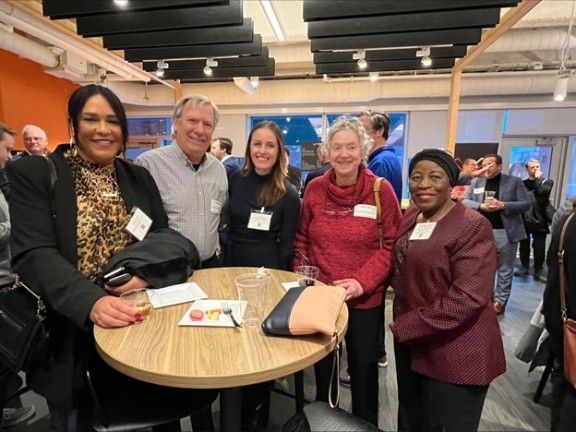 Image of Angelique Hinton, Executive Director, PA Youth Vote; Dave Wilkinson, Board President, Interagency Council of Norristown; Emma Hertz, President & CEO, HealthSpark Foundation; Roberta Brooks, Volunteer, Coalition for Racial Equity and Social Justice; and Dr. Bernadine Eyo Ahonkhai, Founder & CEO, Coalition for Racial Equity and Social Justice standing around a table