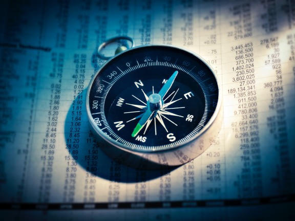 Migrated automatically. compass on newspaper