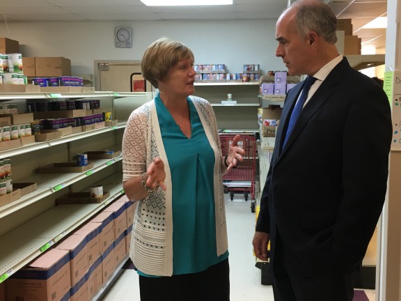 Pottstown Cluster of Religious Communities Executive Director Barbara Wilhelmy gives Sen. Bob Casey a tour of their food pantry. All photos by Tamela Luce.