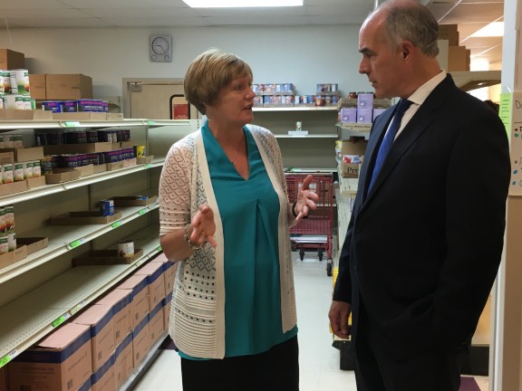 Migrated automatically. Pottstown Cluster of Religious Communities Executive Director Barbara Wilhelmy gives Sen. Bob Casey a tour of their food pantry. All photos by Tamela Luce.