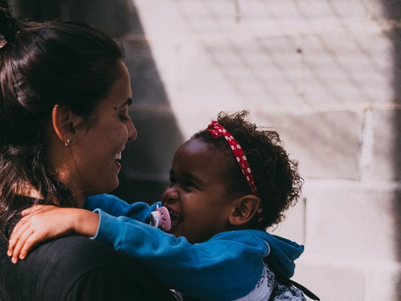 woman holding baby