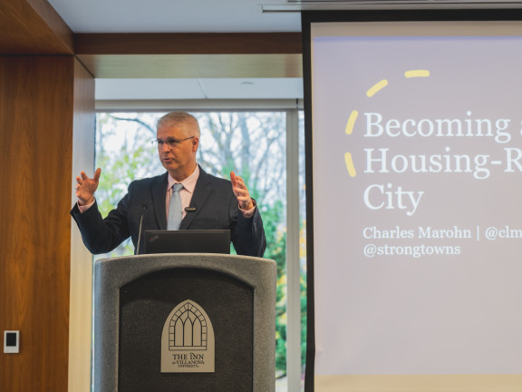 Man at a podium talking