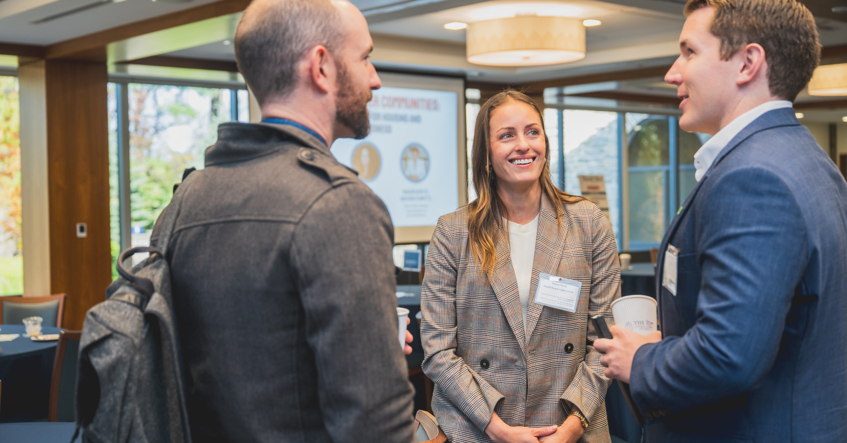 three people talking