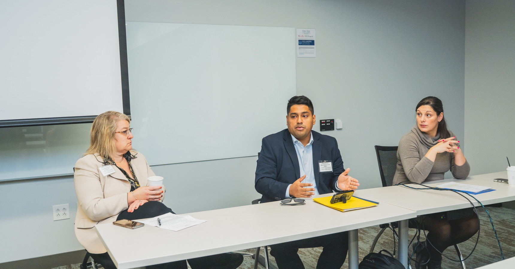 three people at a table