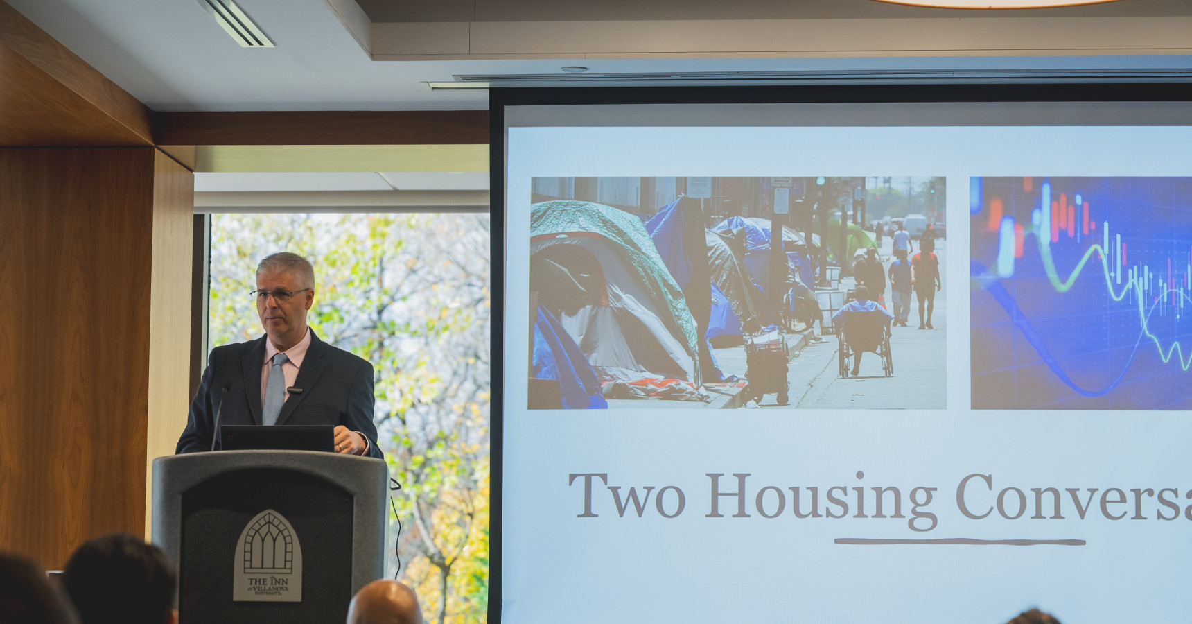 Man at a podium talking