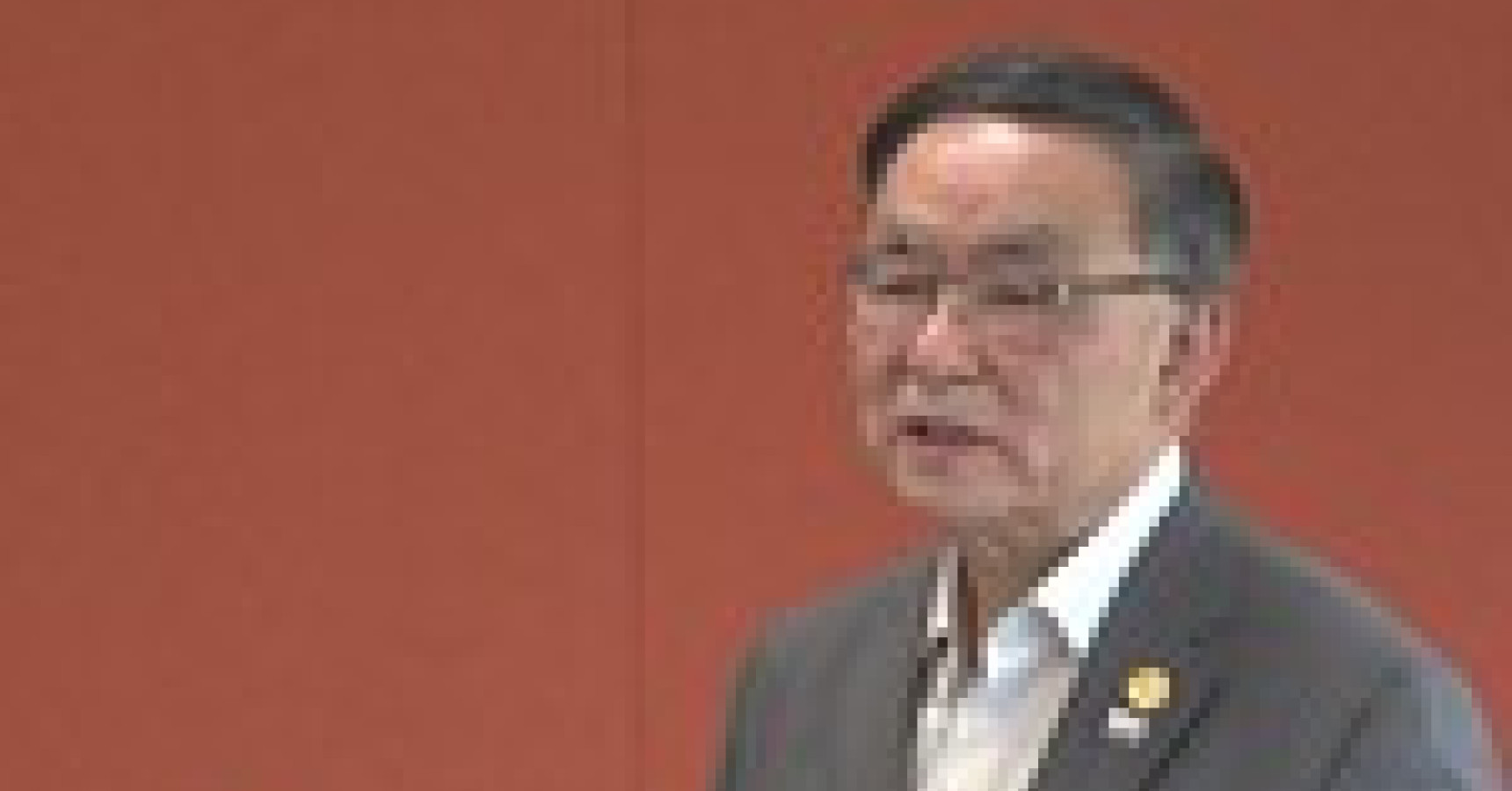 Man at a podium talking