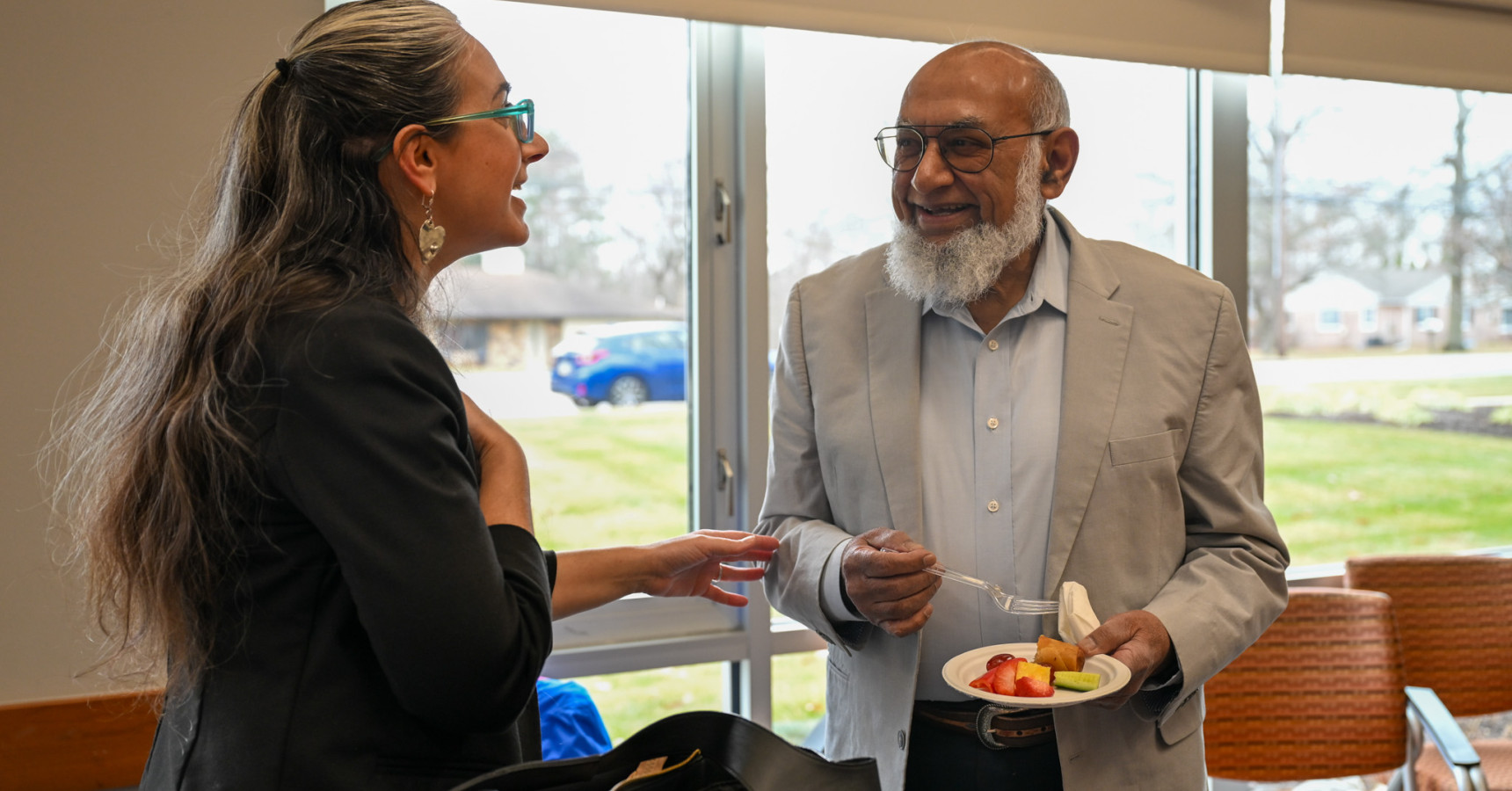 man and woman speaking