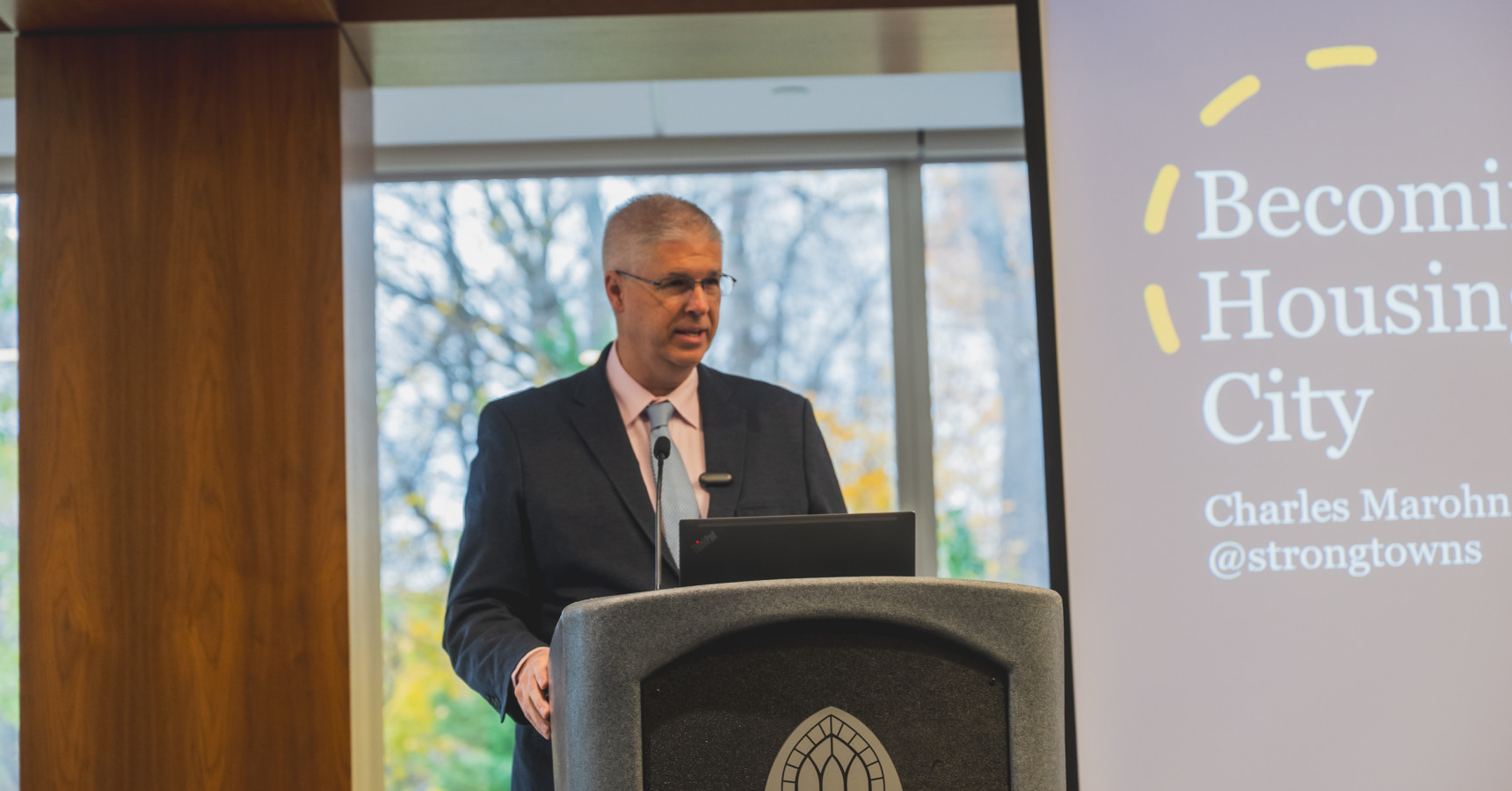 A man speaking at a podium.