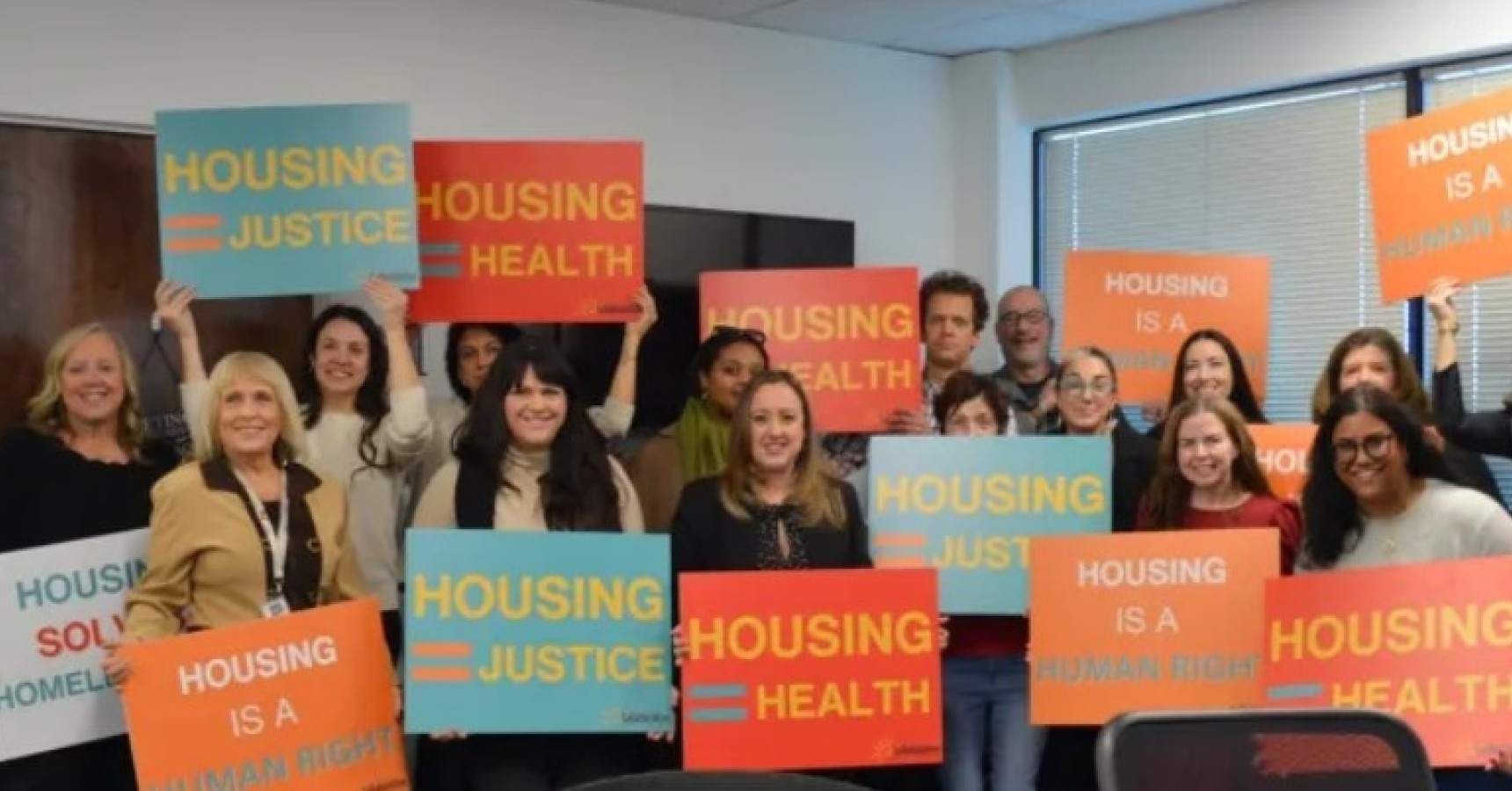 people standing with signs