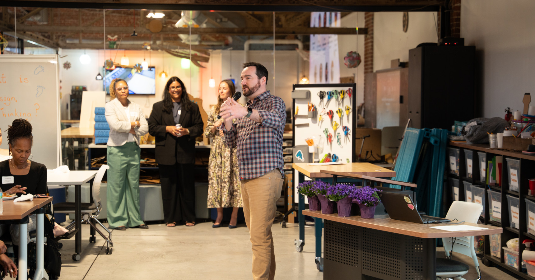 man speaking into a microphone