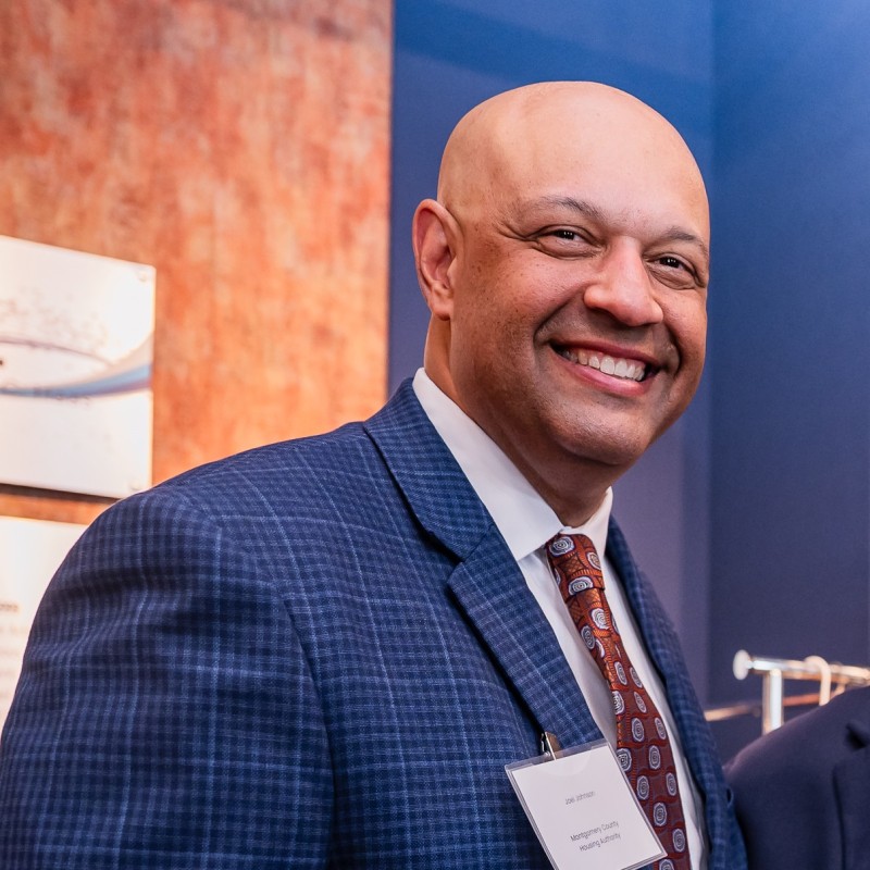 A picture of a man smiling.